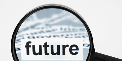 image of a magnifying glass with "future" written inside its lens